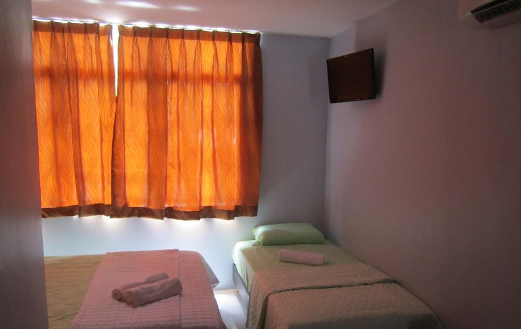 Best Seven Motel Kuah Phòng bức ảnh